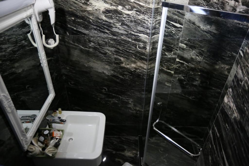 Koupelna v ubytování Hotel Pejton