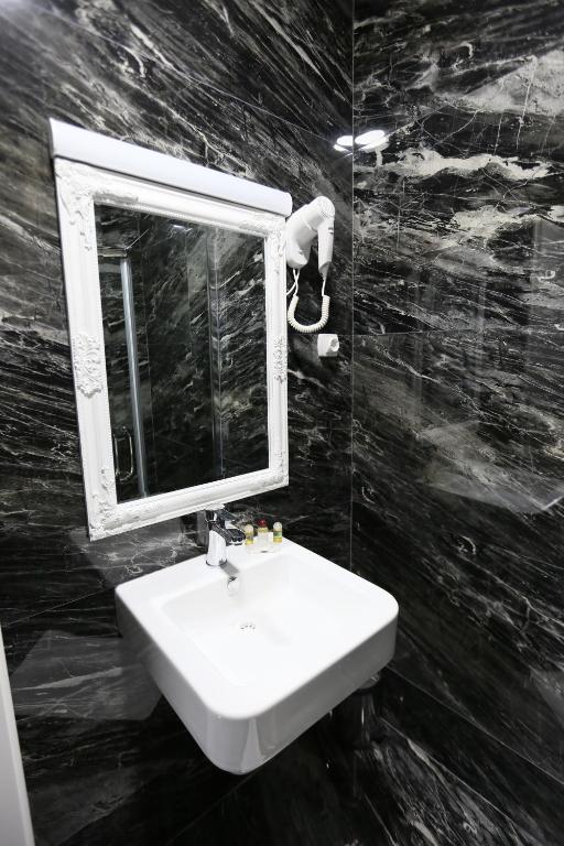 Koupelna v ubytování Hotel Pejton