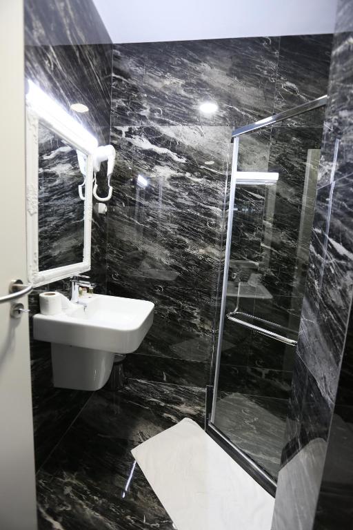 Koupelna v ubytování Hotel Pejton