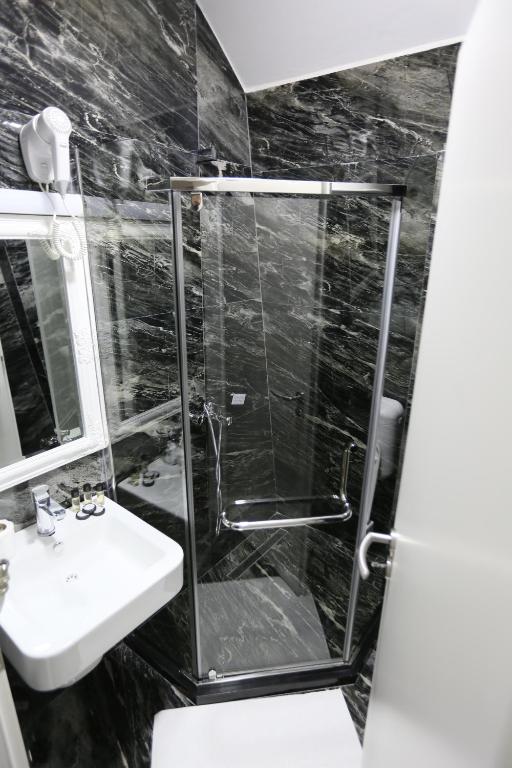 Koupelna v ubytování Hotel Pejton