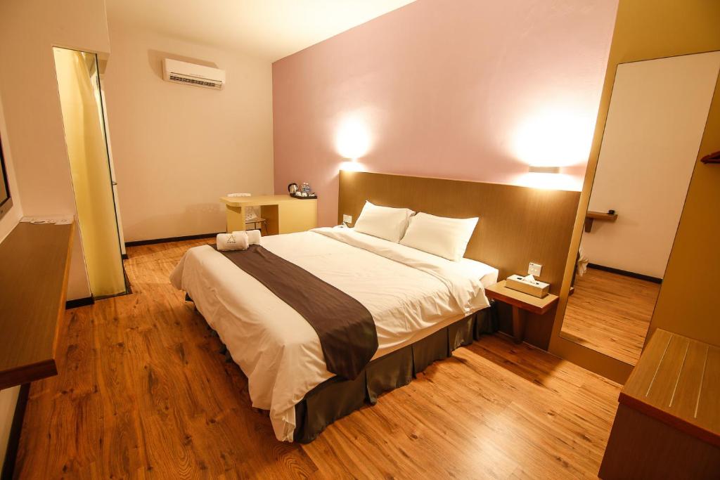 Postel nebo postele na pokoji v ubytování Art Cottage Hotel