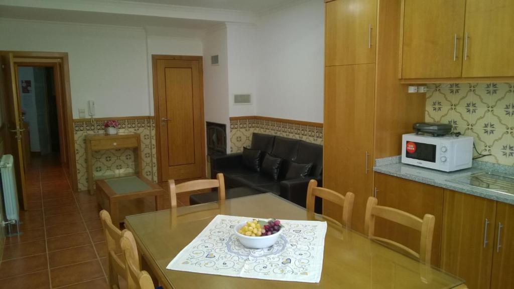 Kuchyň nebo kuchyňský kout v ubytování Casa das Neves