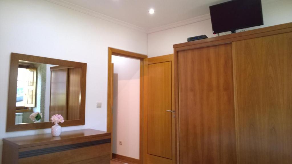 TV a/nebo společenská místnost v ubytování Casa das Neves