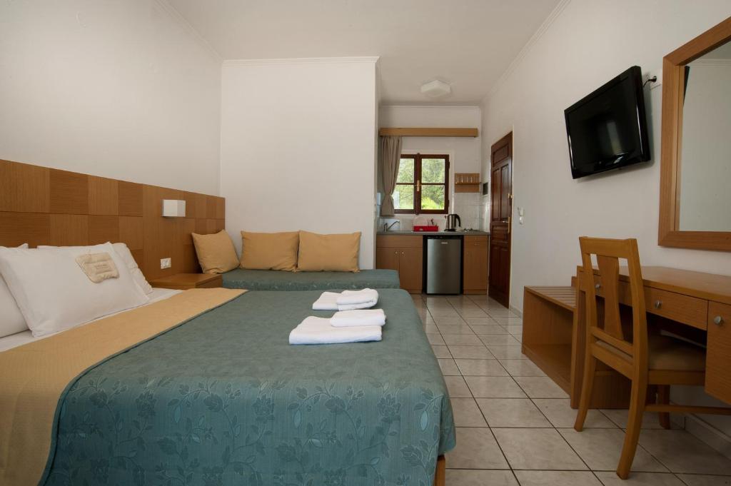 Postel nebo postele na pokoji v ubytování Villa Contessa