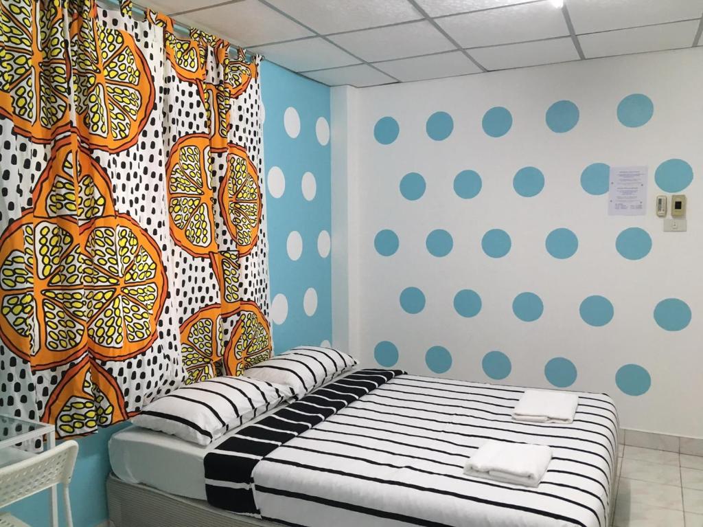 Postel nebo postele na pokoji v ubytování Park Avenue@Huamark