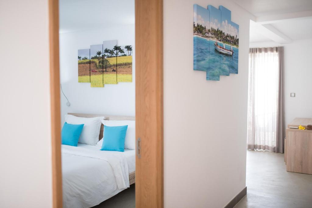 Postel nebo postele na pokoji v ubytování Toparadis Guest House