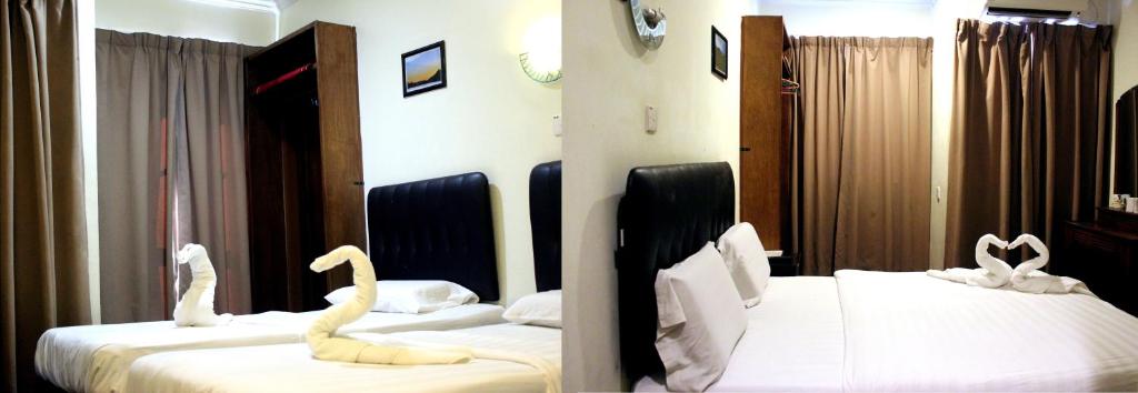 Postel nebo postele na pokoji v ubytování Alonto Hotel