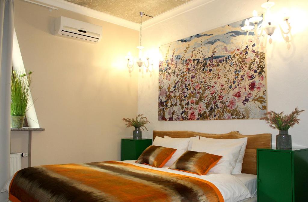 Postel nebo postele na pokoji v ubytování MaNNa Boutique Hotel