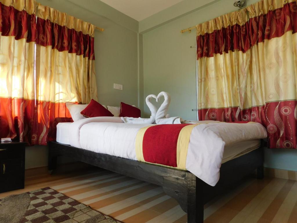 Letto o letti in una camera di Harvest Moon Guest House