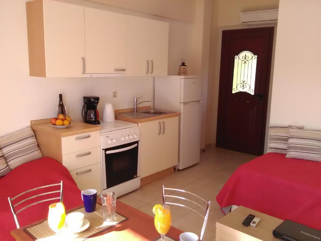 Kuchyňa alebo kuchynka v ubytovaní Mikros Gialos Apartments