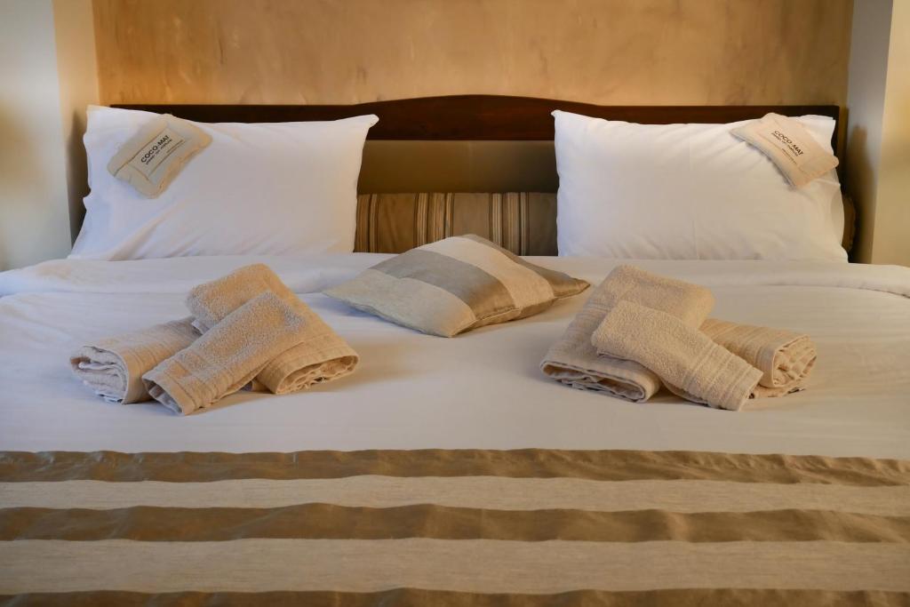 Postel nebo postele na pokoji v ubytování Hotel Rodovoli