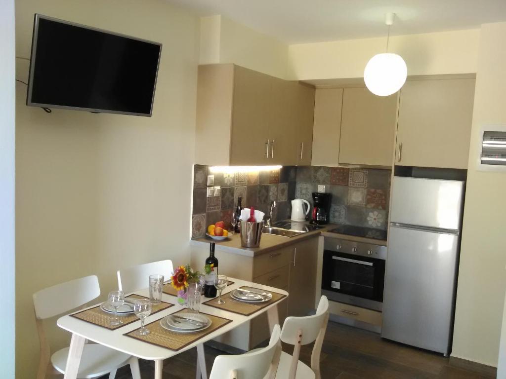 Kuchyňa alebo kuchynka v ubytovaní Mikros Gialos Apartments
