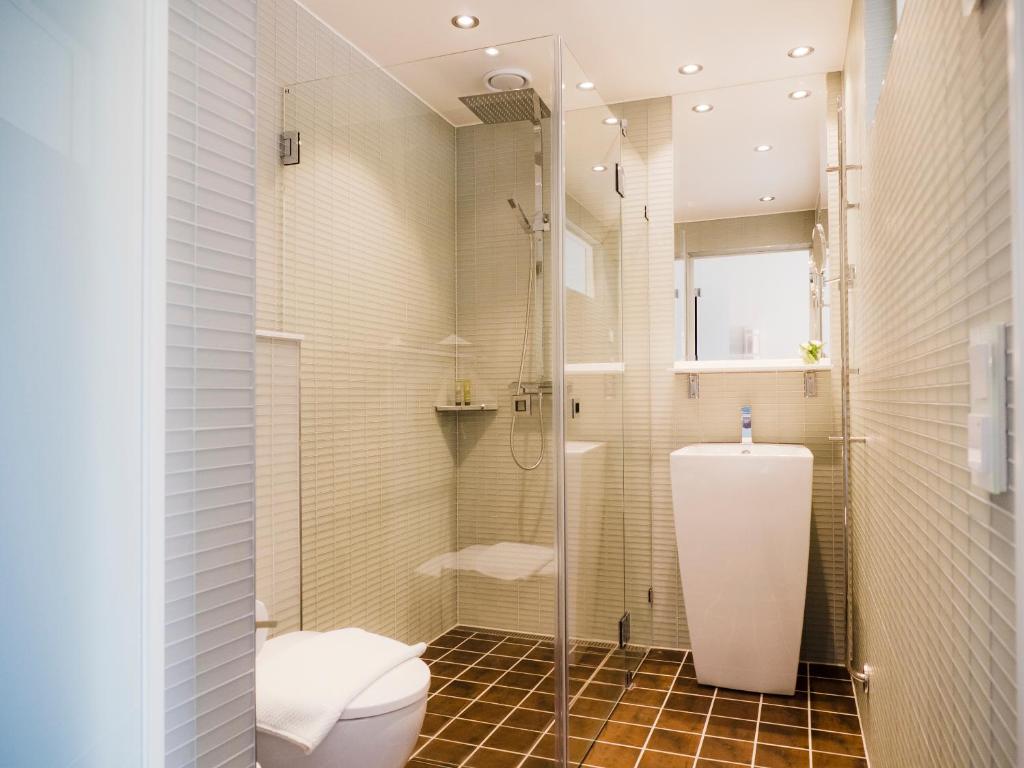 Koupelna v ubytování Hotel Lundia