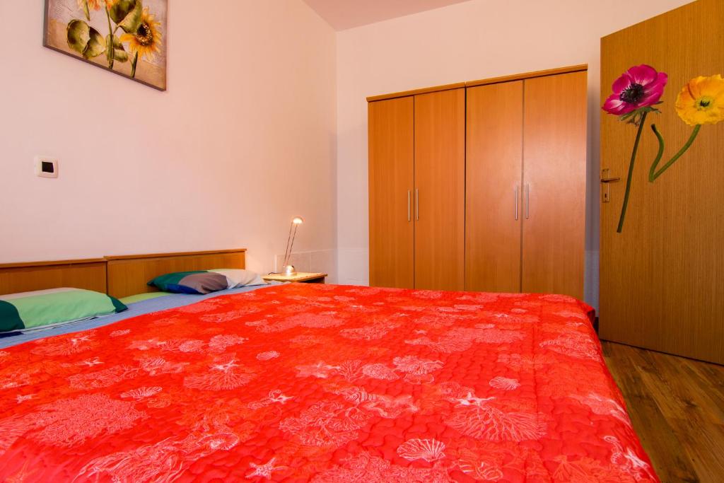 Łóżko lub łóżka w pokoju w obiekcie Apartments Nada 354