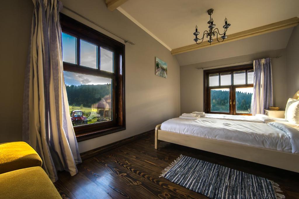 En eller flere senge i et værelse på The Provence Village