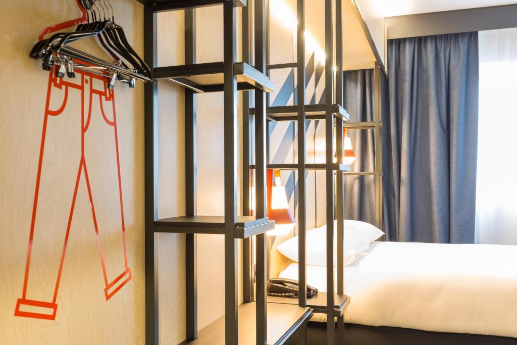 Postel nebo postele na pokoji v ubytování ibis Styles Geneve Palexpo Aeroport