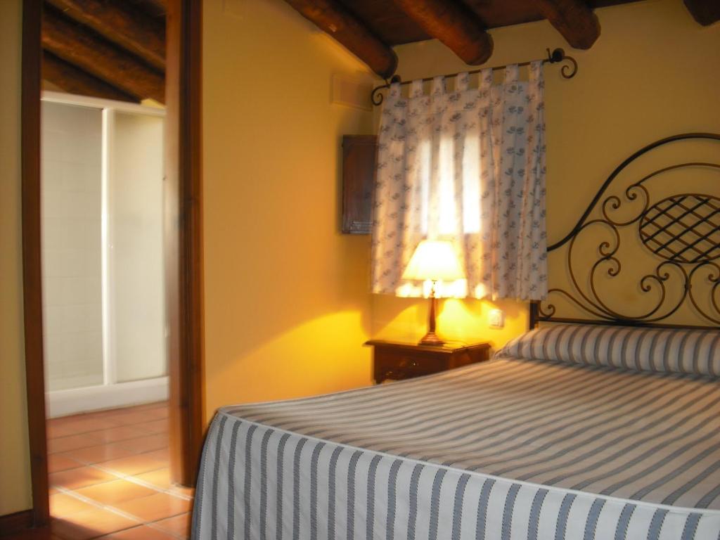 Postel nebo postele na pokoji v ubytování Casa de Oria