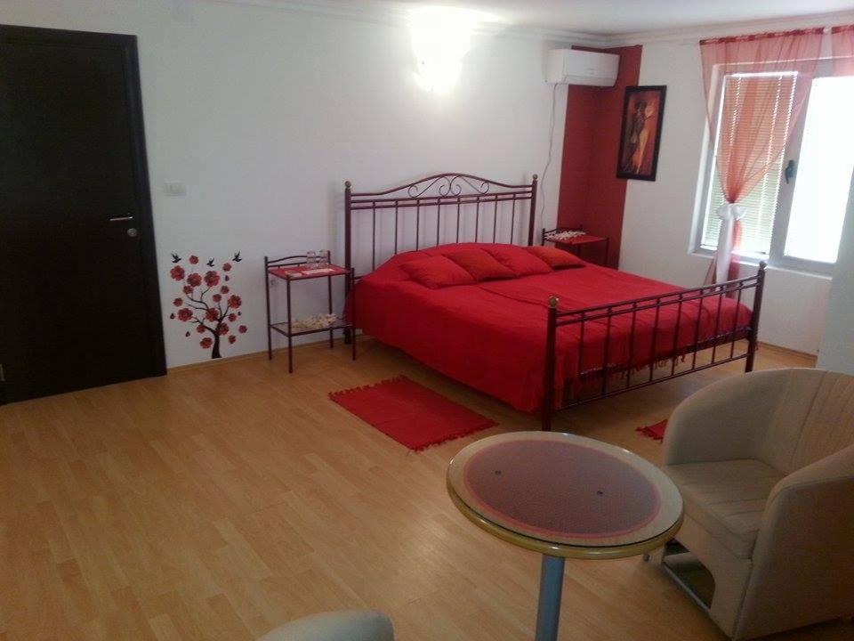 Postel nebo postele na pokoji v ubytování B&B Queen