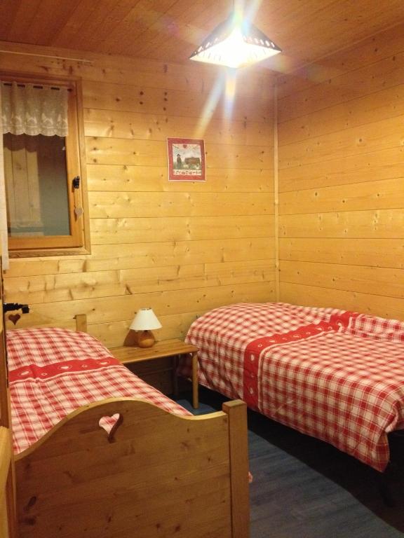 Postel nebo postele na pokoji v ubytování Chalet La R'Batte