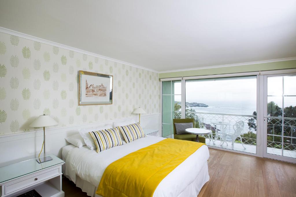 Postel nebo postele na pokoji v ubytování Hotel Isla Seca