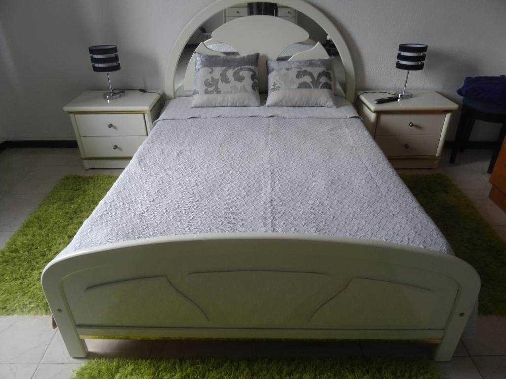 Postel nebo postele na pokoji v ubytování Casa Teresinha