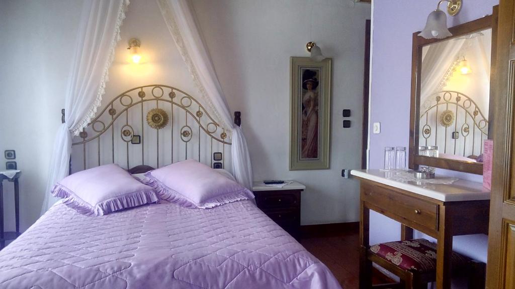 Postel nebo postele na pokoji v ubytování Mansion Theodora