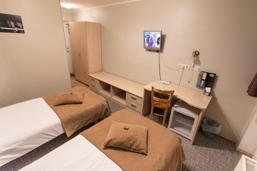 Postel nebo postele na pokoji v ubytování Endla Hotell