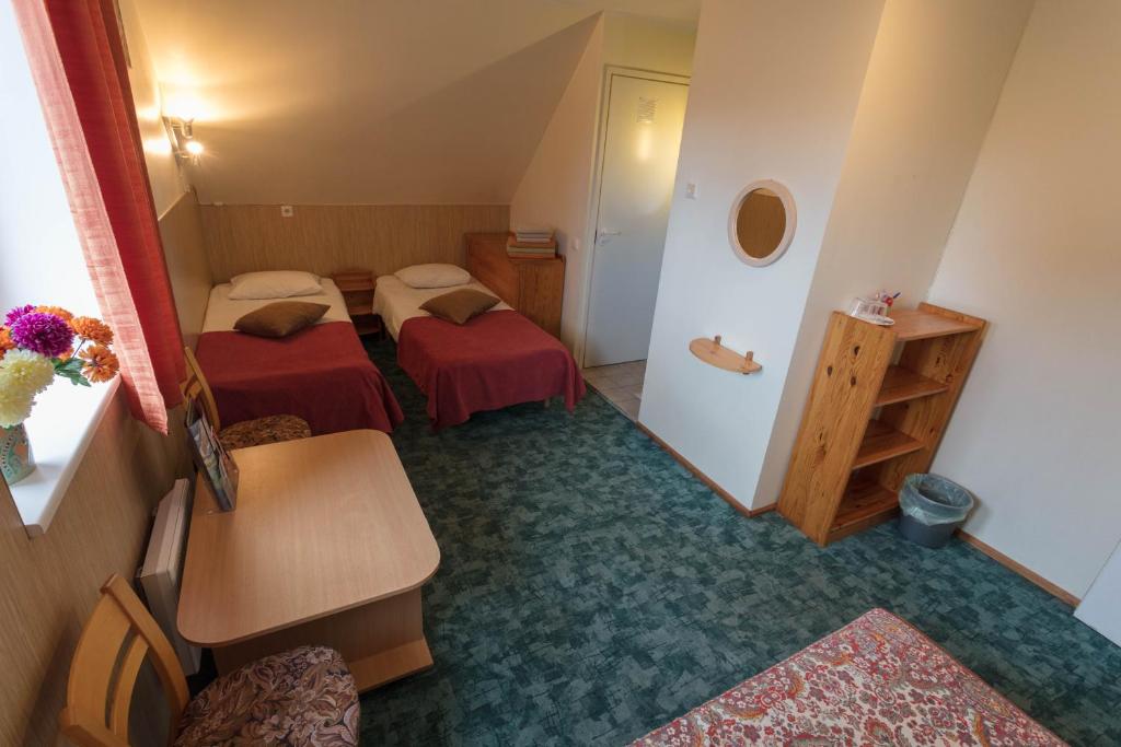 Postel nebo postele na pokoji v ubytování Endla Hotell