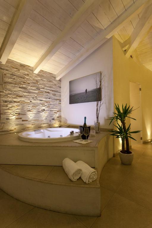 TV a/nebo společenská místnost v ubytování Hotel Barracuda
