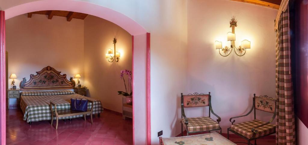 Postel nebo postele na pokoji v ubytování Hotel Barracuda