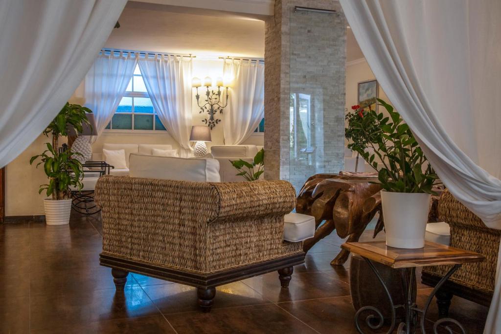 Postel nebo postele na pokoji v ubytování Hotel Barracuda