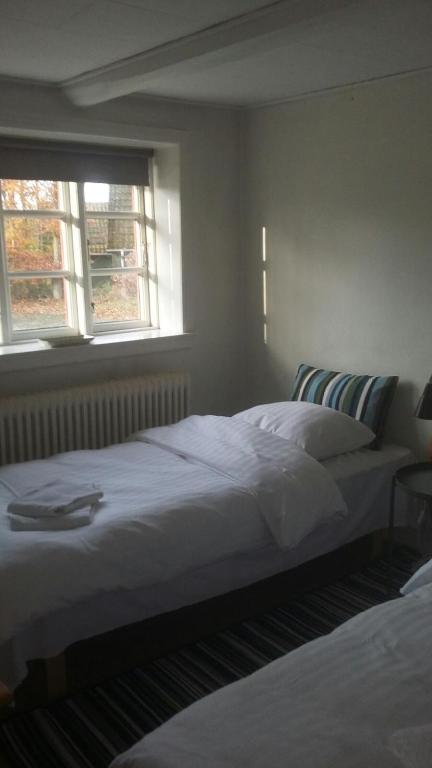 Letto o letti in una camera di Dancamps Trelde Naes