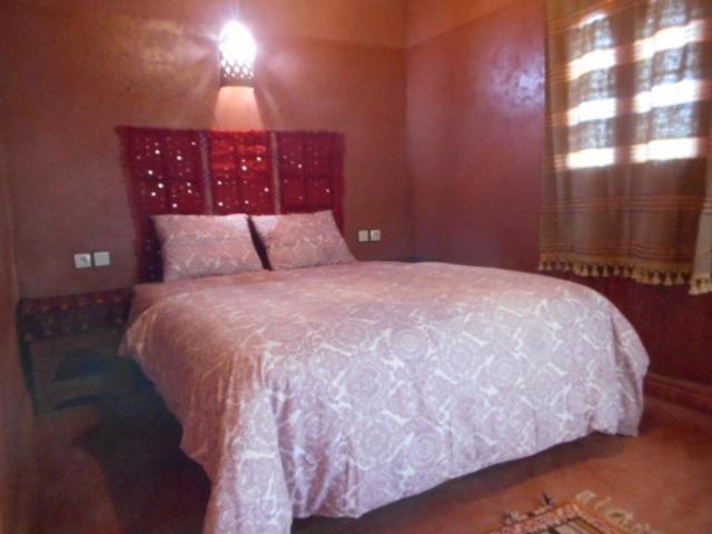 Letto o letti in una camera di Hotel Carrefour des Nomades