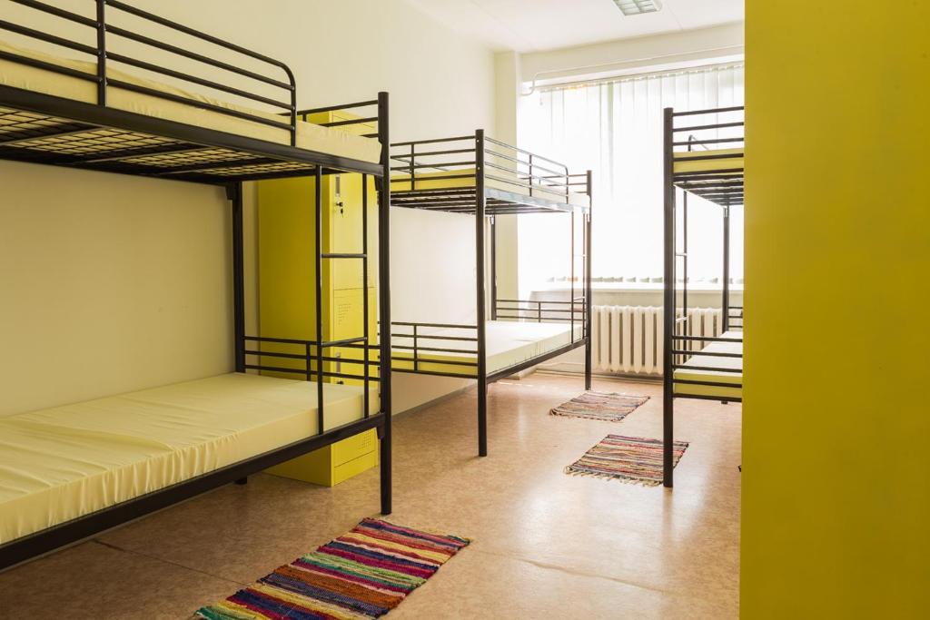 Postel nebo postele na pokoji v ubytování EHE Hostel