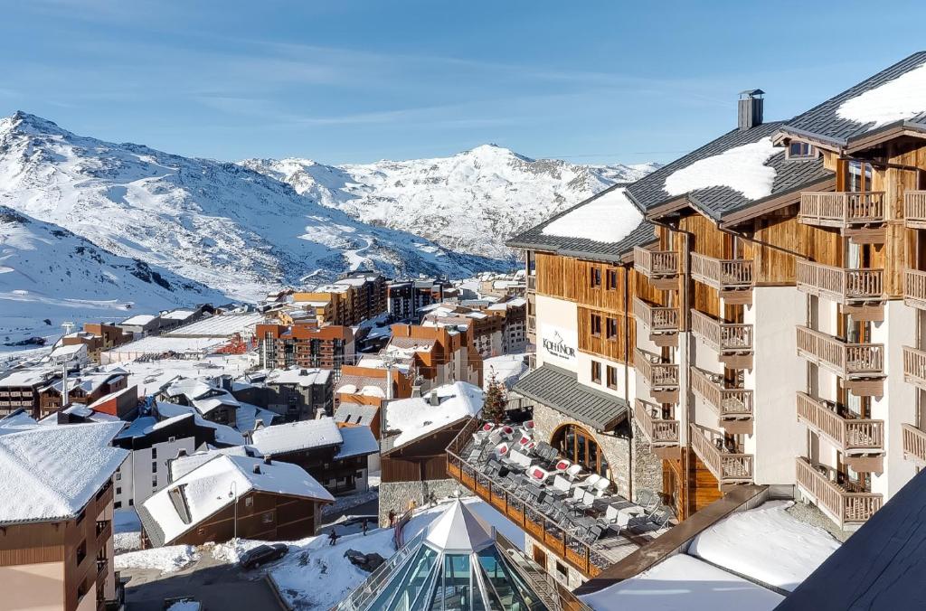 an aerial view of a town with snow covered mountains at Résidence Koh-I Nor by Les Etincelles in Val Thorens