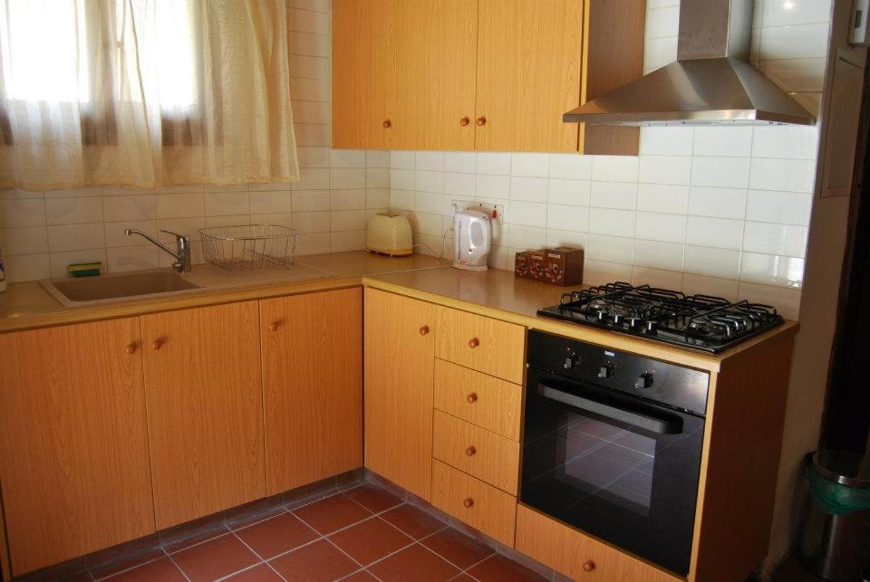 Kuchyň nebo kuchyňský kout v ubytování Xenis House