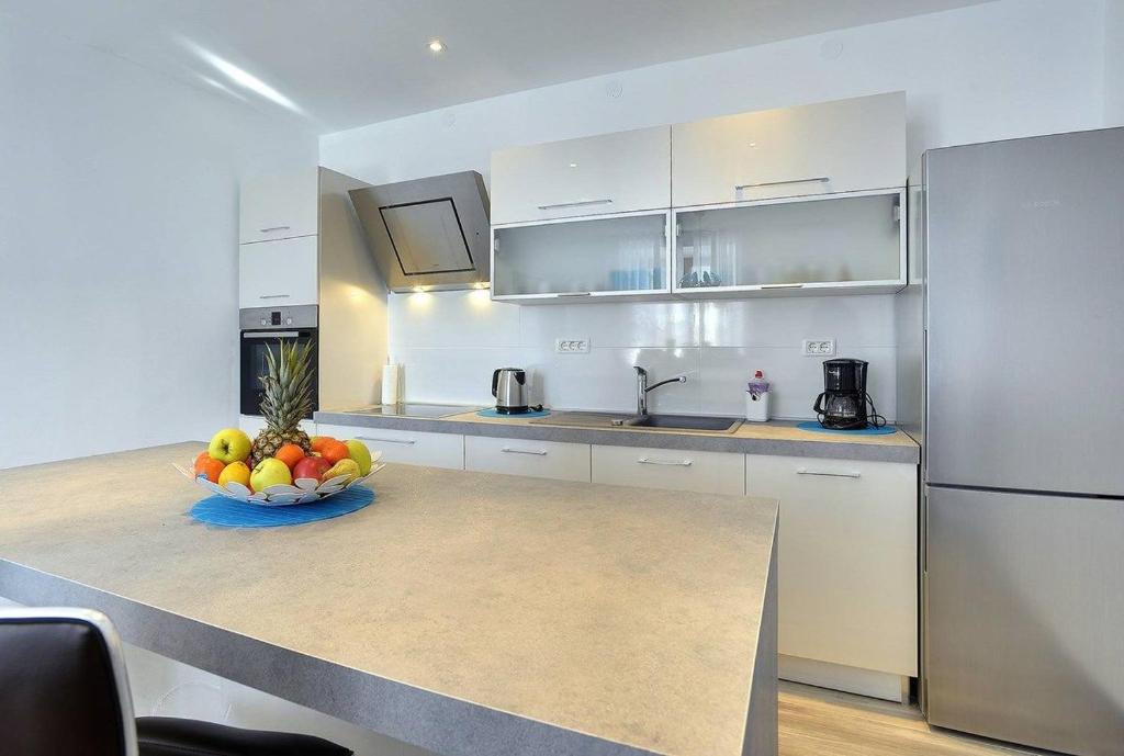 Kuchyň nebo kuchyňský kout v ubytování Holiday Home Miceli