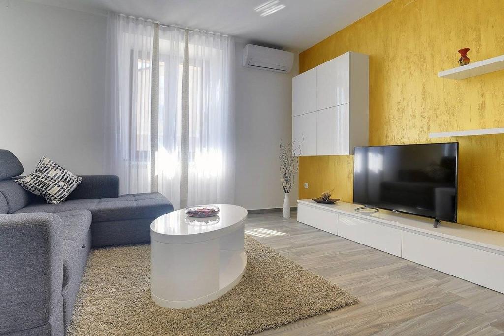 TV a/nebo společenská místnost v ubytování Holiday Home Miceli