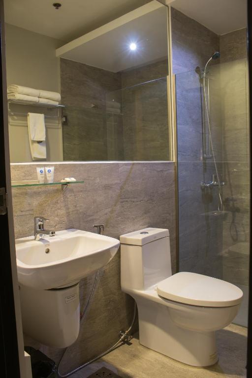 Koupelna v ubytování 1A Express Hotel