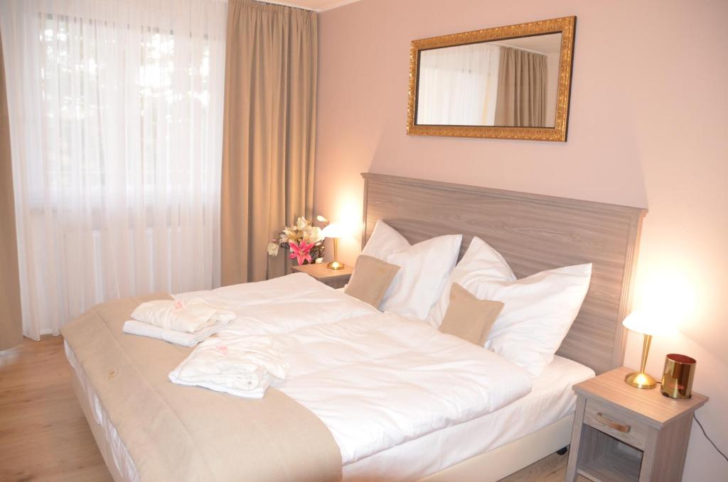 Postel nebo postele na pokoji v ubytování Resort Erich