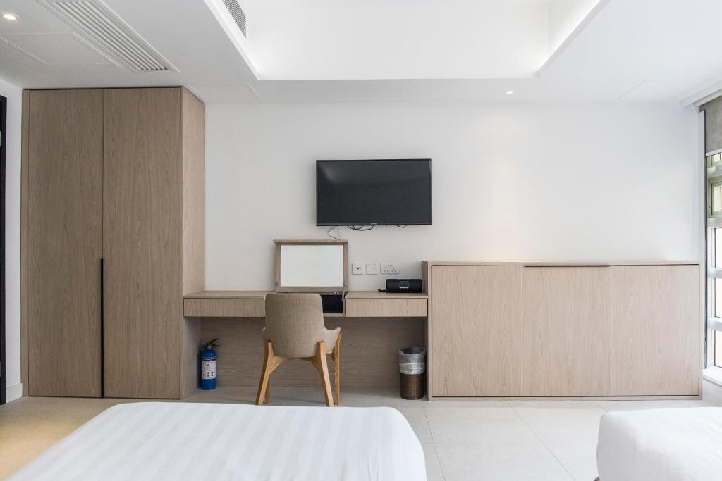 TV a/nebo společenská místnost v ubytování Wifi Boutique Hotel