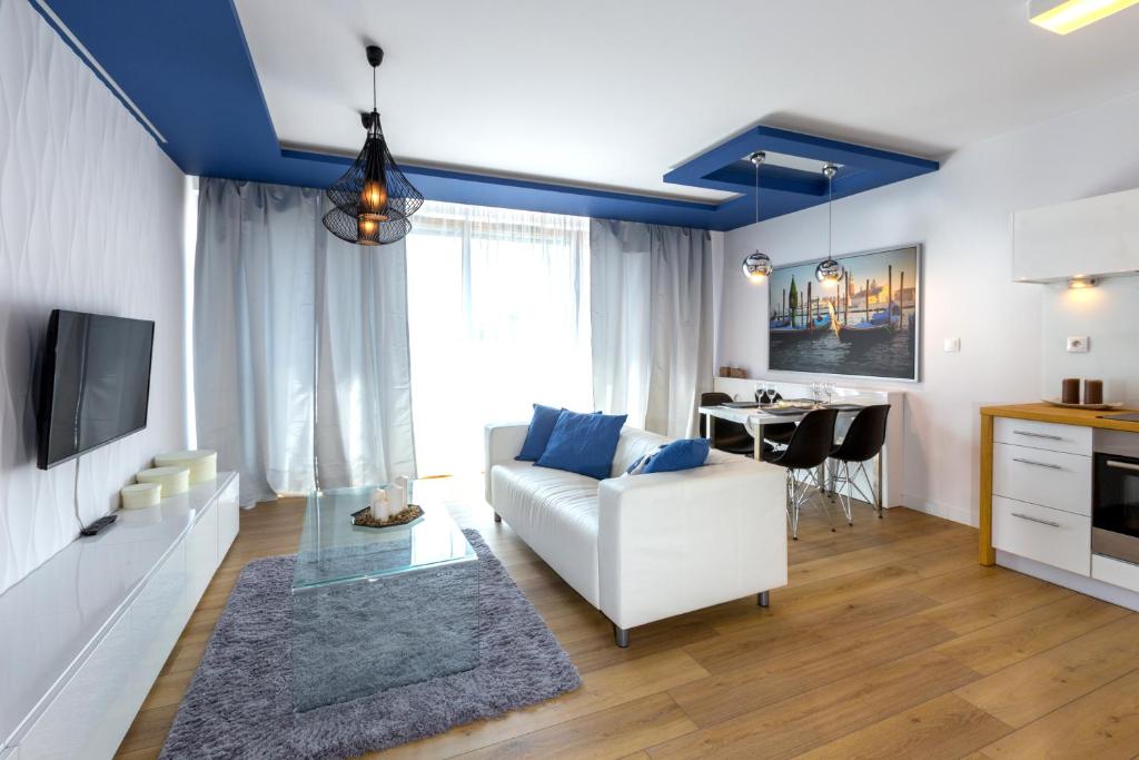 TV a/nebo společenská místnost v ubytování Kazimierz Friendhouse Apartments
