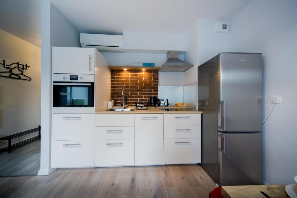 Kuchyň nebo kuchyňský kout v ubytování Kazimierz Friendhouse Apartments