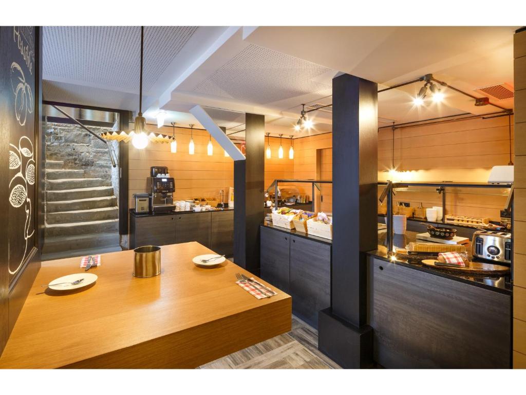 A kitchen or kitchenette at Swiss Night by Fassbind