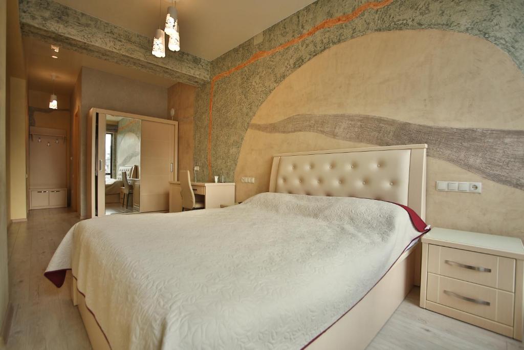 Postel nebo postele na pokoji v ubytování Hotel Wine Palace