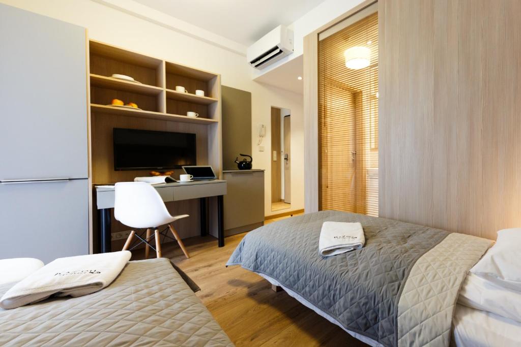Posteľ alebo postele v izbe v ubytovaní Apartments "Wolska Residence"