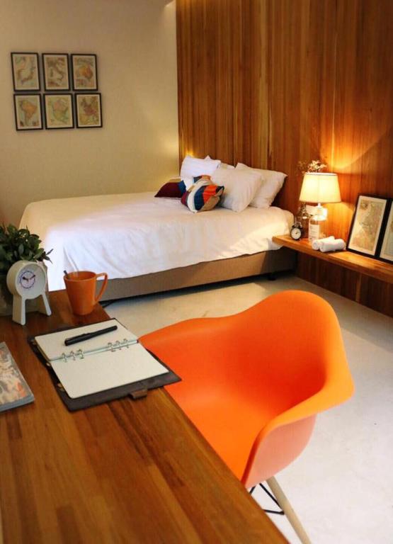 Postel nebo postele na pokoji v ubytování NornDee Hotel
