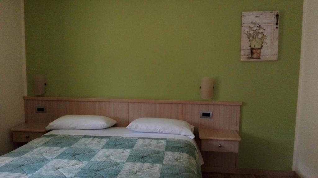 Postel nebo postele na pokoji v ubytování Garni Delia