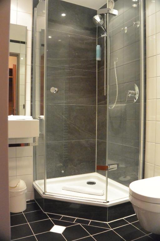 Koupelna v ubytování Atrium Hotel Krüger
