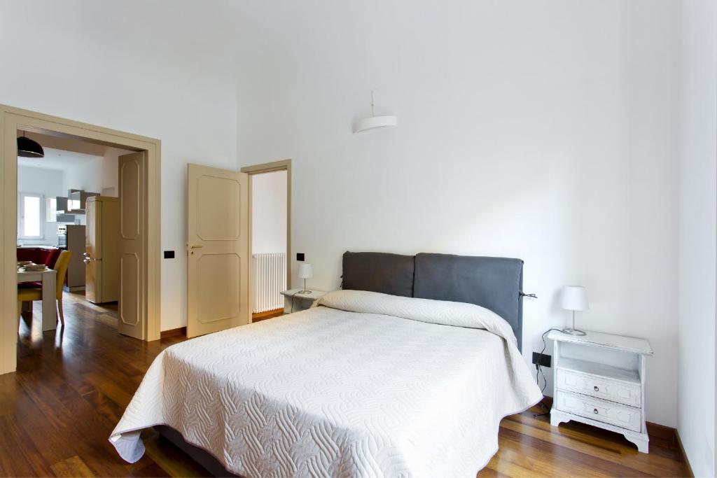 Posteľ alebo postele v izbe v ubytovaní Dante Vintage Apartment